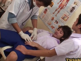 Young Asian boy gets a three woman treatment at the doctor’s office