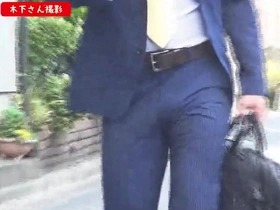 Young Asian men in suits having sex with each other