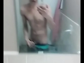 Gay bathroom scene with hot solo action and big dick
