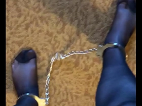 Gay pantyhose and leg iron BDSM scene