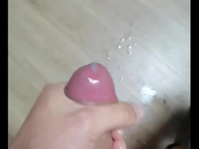 Solo boy with an Asian appearance enjoys a handjob and cums in mouth while wearing a chain.