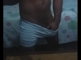 Young gym trainer with a nice body gives solo performance and masturbates.