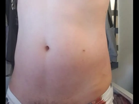 Young gay boxer showing off his goods in low-rise shorts