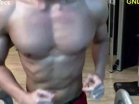 Asian hunk works out his chest for nipple teasing.