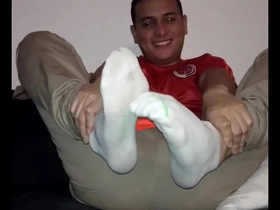 Gay feet fetish with a Latino slave and his master.