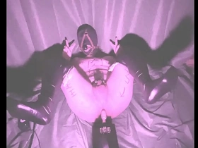 A young man with his limbs tied up experiences great pleasure.