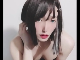 Japanese crossdressers in female costumes.