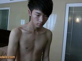 Small and straight Asian boy masturbates after taking a bath.
