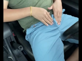 An Asian boy with a small dick masturbates in the car.