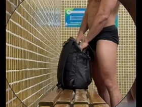 New video of a public bath scene in a gay club with a black security officer.