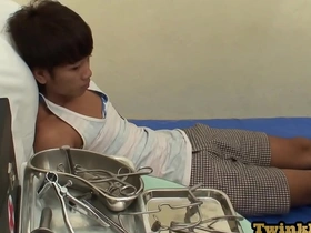 Small Asian twink gets taken care of by a doctor in his ambulance.